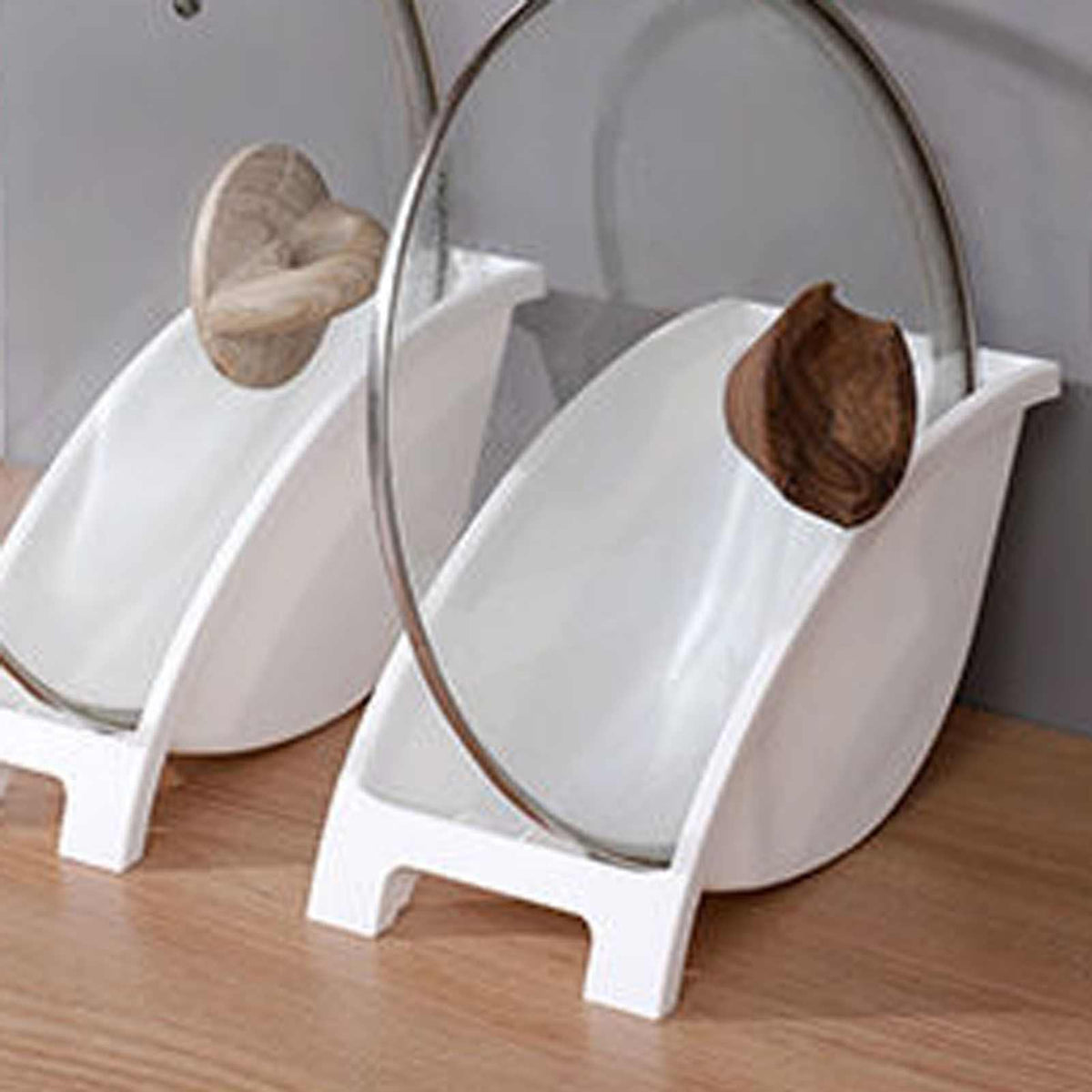 Japanese Kitchen Dish rack in white plastic, with angled plate slots holding upright round plates and bowls