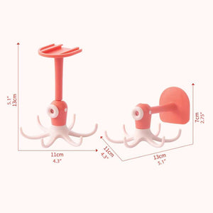 Kitchen 360° Rotated Hooks in coral and white plastic, featuring a rotating disc, adhesive wall mount and multiple curved claws