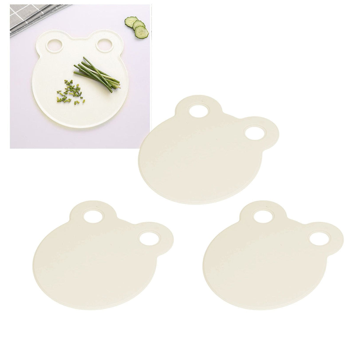 Kitchen Cutting Board in ivory beige plastic with a smooth, rounded bear-face shape and two circular ear holes