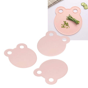 Kitchen Cutting Board set of round pink plastic boards with two loop-shaped cutouts and smooth surfaces