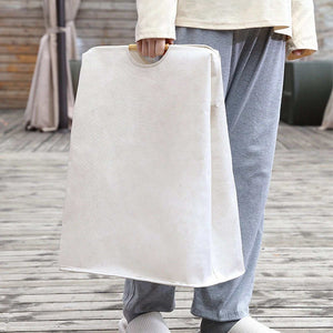 Laundry Basket Waterproof, a large cream fabric hamper with a wide rectangular body and integrated loop handles