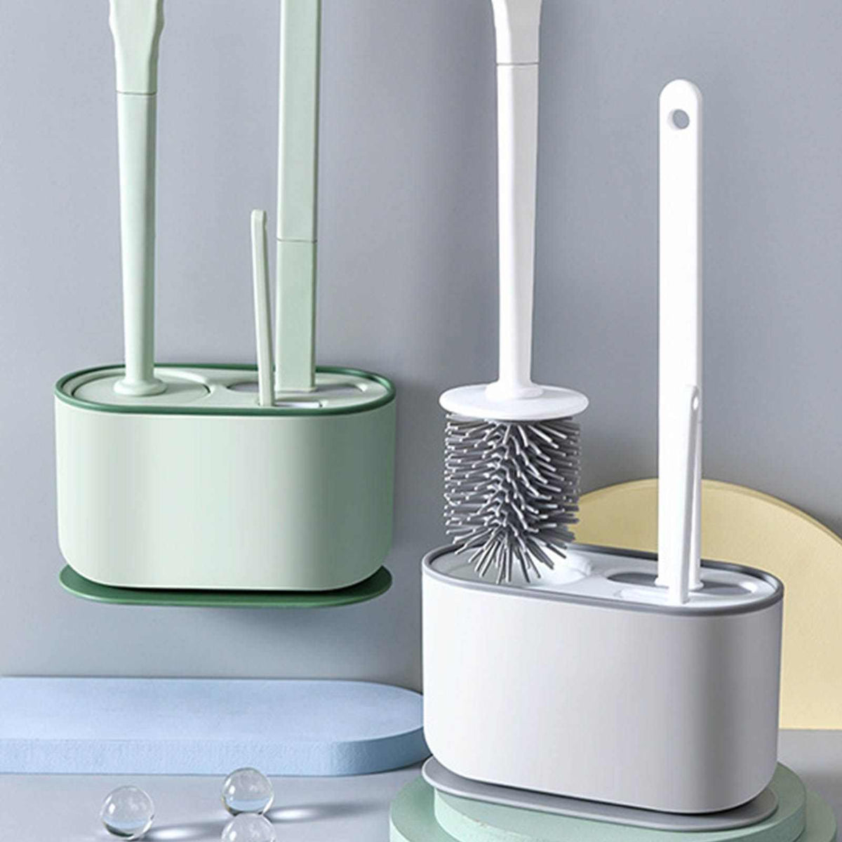 Long Handle Toilet Brush Set with green plastic holder and flexible brush heads, including a white brush beside it