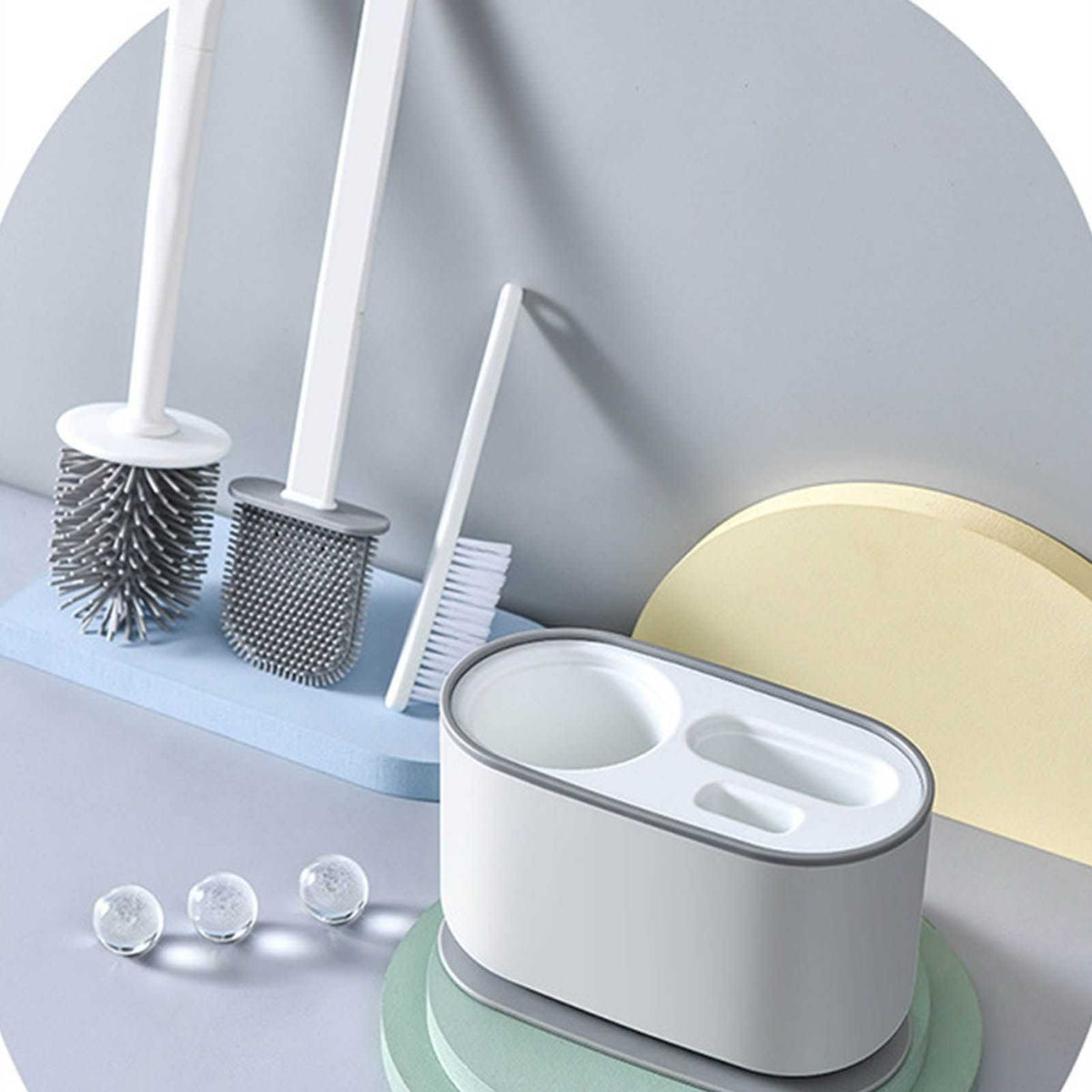 Long Handle Toilet Brush Set with white plastic handles, varied bristle heads and an oval ventilated holder