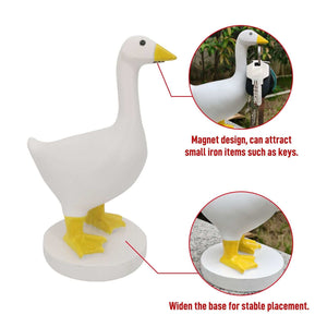 Magnetic Goose Key Holder in white resin with a yellow beak and feet, standing on a wide round base