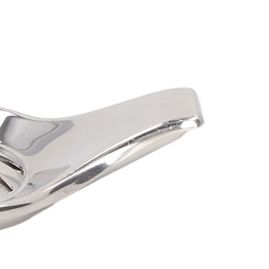 Manual Lemon Juicer in polished silver stainless steel, showing a smooth curved handle and firm clamp design