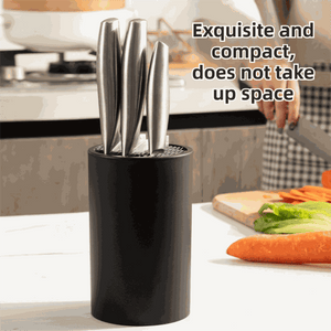 Matte Black Modern knife block with a smooth cylindrical finish, holding several stainless steel knives in its wavy insert