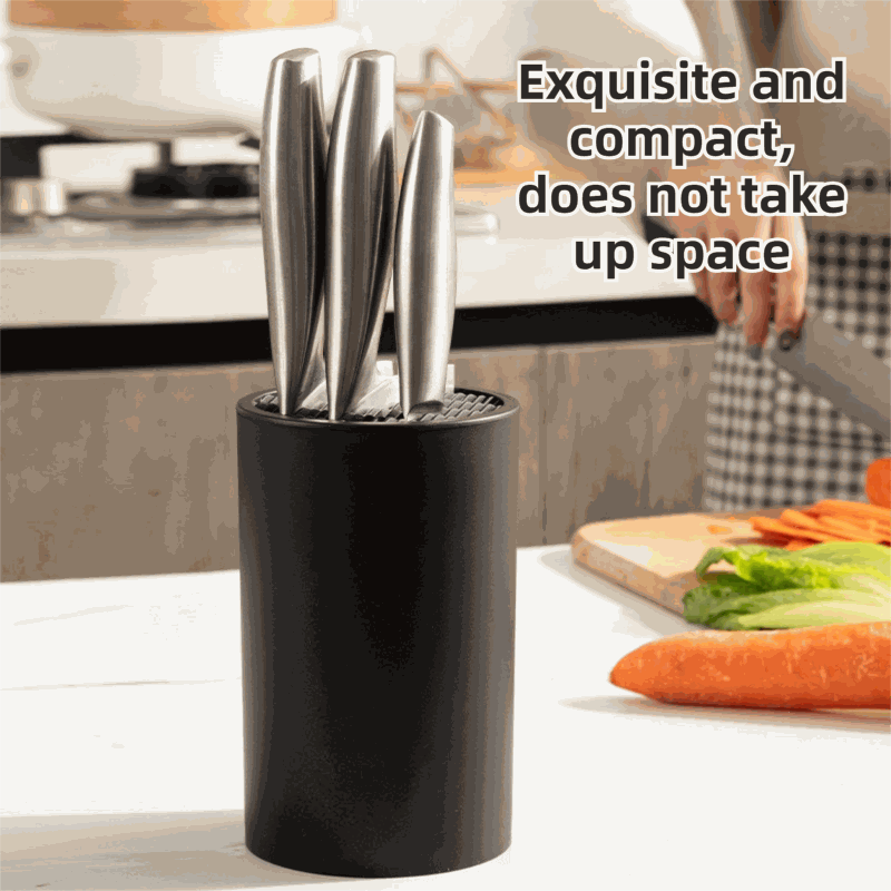 Matte Black Modern knife block with a smooth cylindrical finish, holding several stainless steel knives in its wavy insert