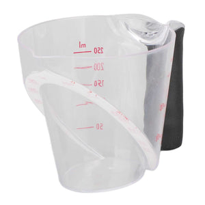Measuring Cup Heat Resistant in clear plastic with red dual-scale markings, angled profile and black anti-slip handle.