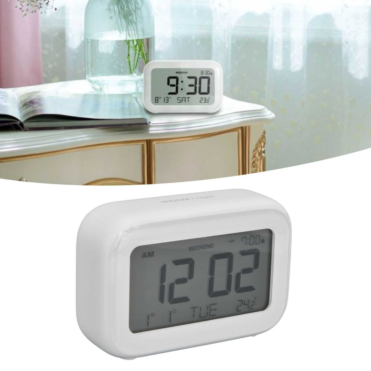 Mini Digital Alarm Clock in smooth white plastic with a rounded rectangular body and large grey LCD display showing time, date and alarm indicators.