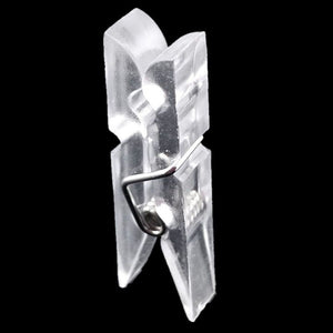 Mini Transparent Plastic clip in clear plastic with a silver metal spring, featuring a compact clothespin shape