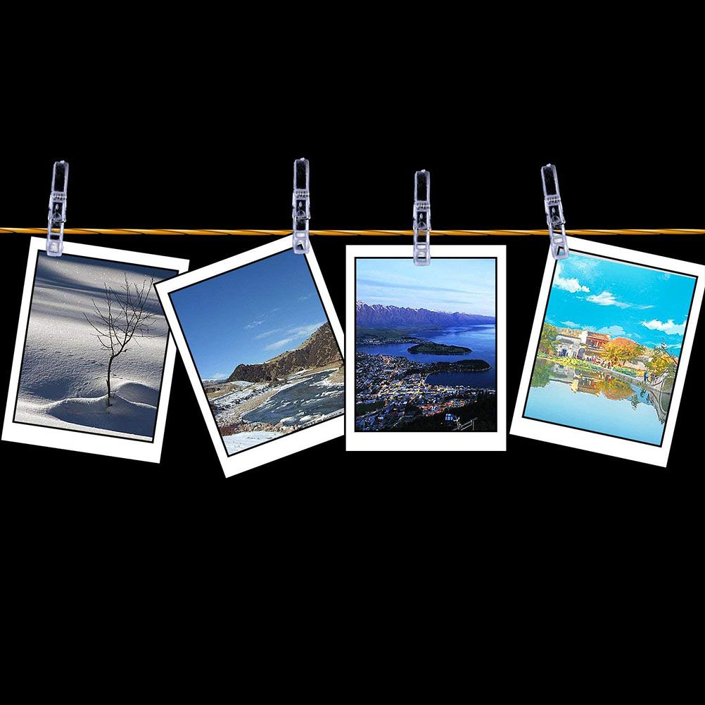 Mini Transparent Plastic clips with clear bodies and metal springs, holding four colourful photographs on a string