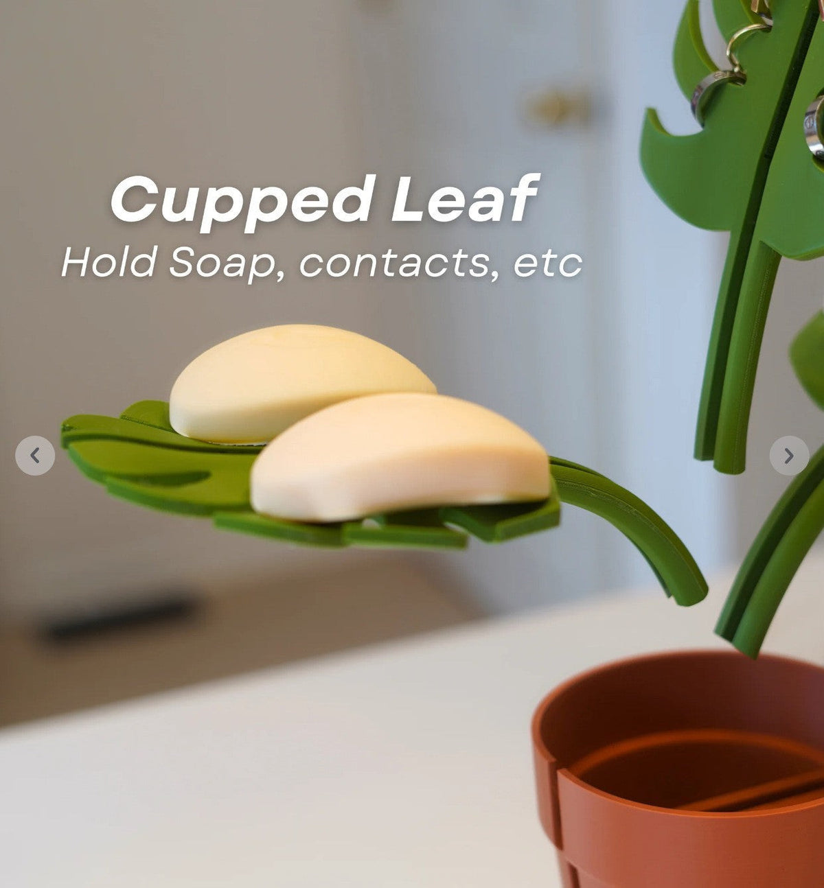 Mirror-Mount Half-Leaf Monstera soap holder with bright green cupped leaf and matching stem, holding two bars of soap