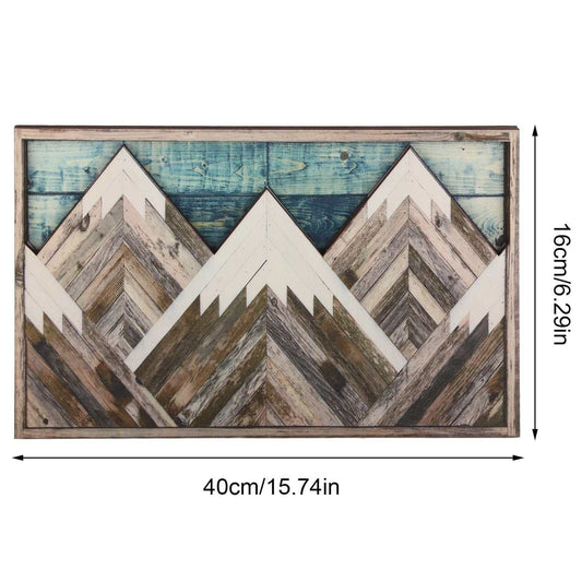 Mountain Wood Wall Art with layered geometric peaks in weathered brown, cream and grey wood beneath a blue plank sky