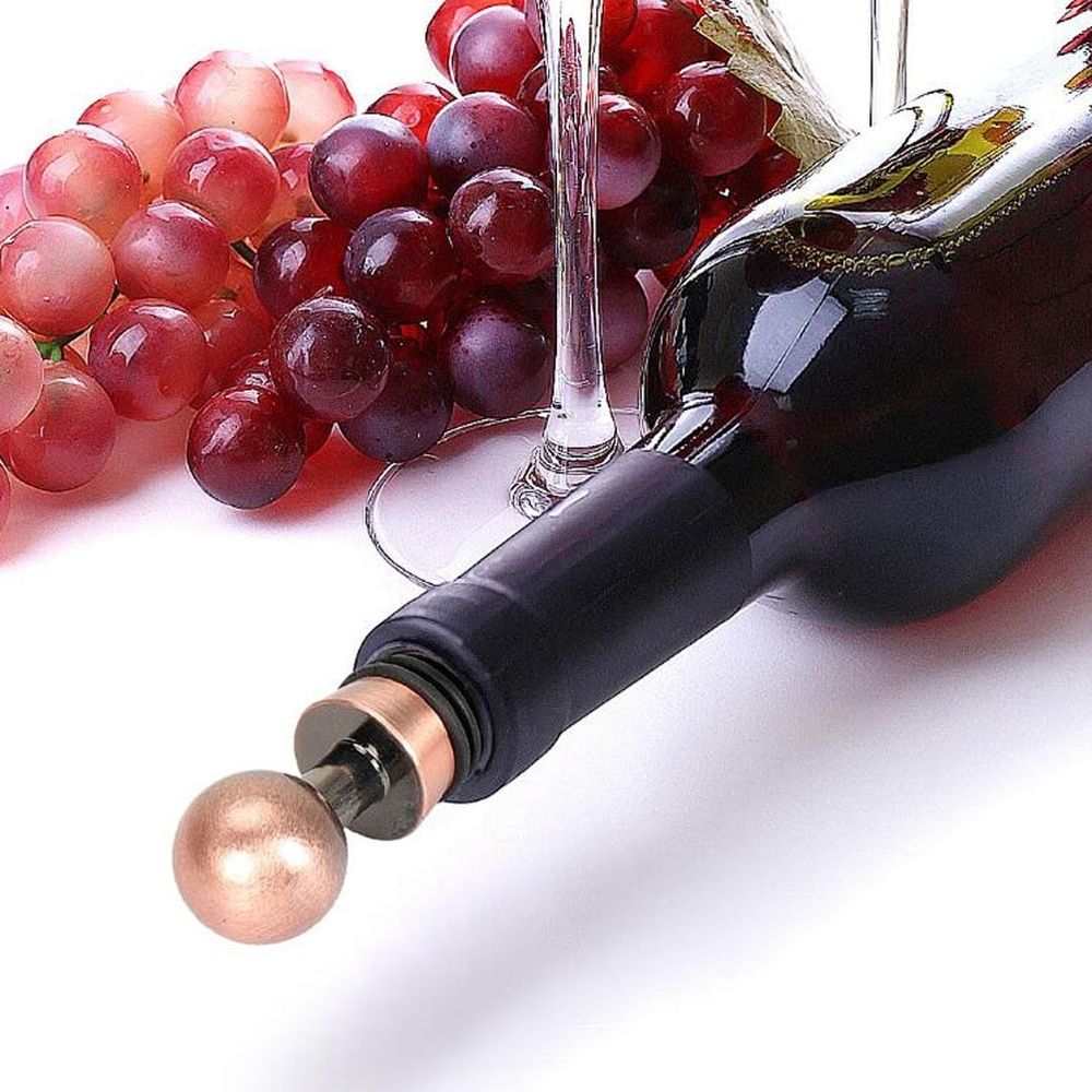 Wine bottle stopper in black with rose-gold stainless steel accents and a round metallic handle, Multi Color Stainless Steel