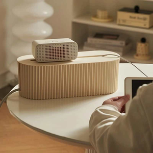 Multi-Scene Cable Storage Box in beige ribbed plastic with a white lid and side cable openings, concealing cords