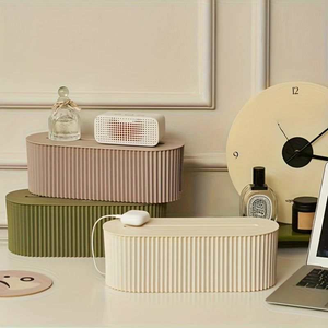 Multi-Scene Cable Storage Box in cream ribbed plastic with a cable opening, shown beside mauve and olive boxes