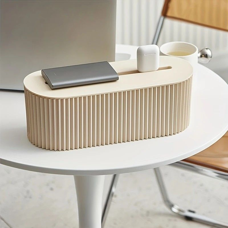 Multi-Scene Cable Storage Box in cream plastic with a ribbed oval body, flat lid, and a narrow cable slot