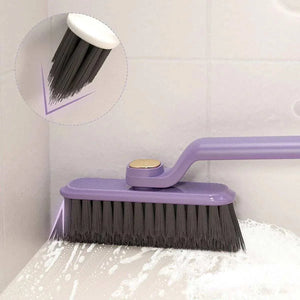 Multifunctional 360° Rotary Cleaning Brush with a purple plastic handle, wide head and dense dark bristles.