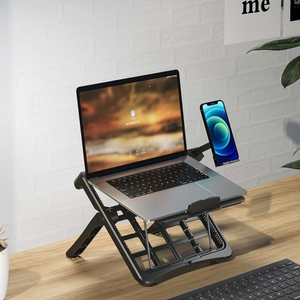 Multifunctional Laptop Stand in black with a foldable open-frame base, adjustable supports and a side phone holder