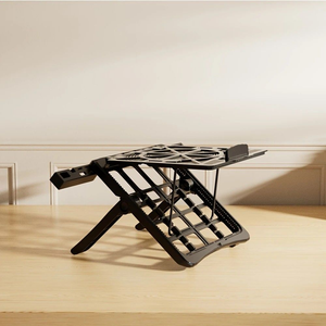 Multifunctional Laptop Stand in black metal with an open geometric frame, foldable legs and raised side supports