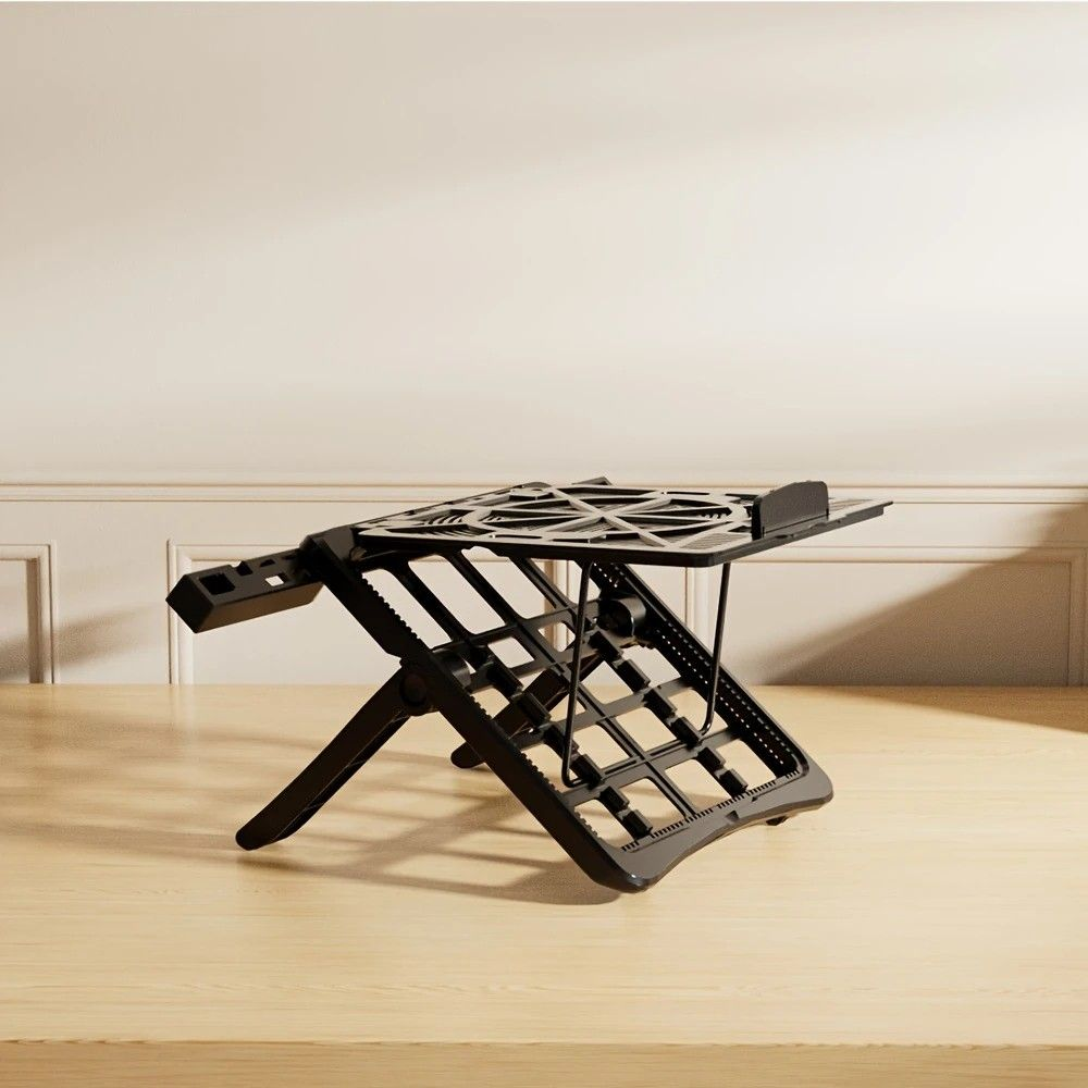 Multifunctional Laptop Stand in black metal with an open geometric frame, foldable legs and raised side supports