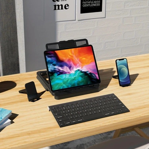Multifunctional Laptop Stand in black with a foldable open-frame base, supporting a tablet beside a removable phone holder
