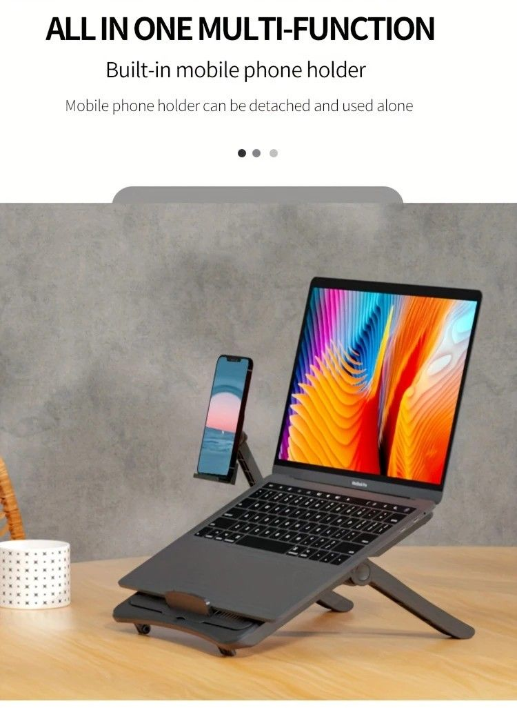 Multifunctional Laptop Stand in dark gray metal with an angled laptop platform, folding legs and detachable phone holder