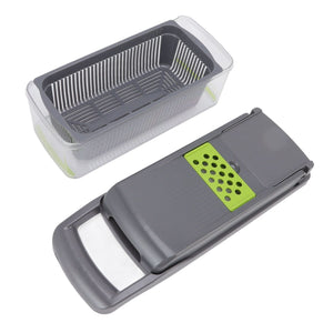 Multifunctional Vegetable Cutter with a dark gray slicer, lime-green grater insert, and clear rectangular filter basket