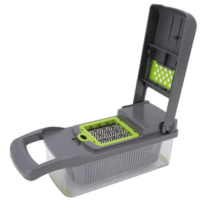 Multifunctional Vegetable Cutter in charcoal grey plastic with lime green accents, interchangeable metal blades and a clear collection box