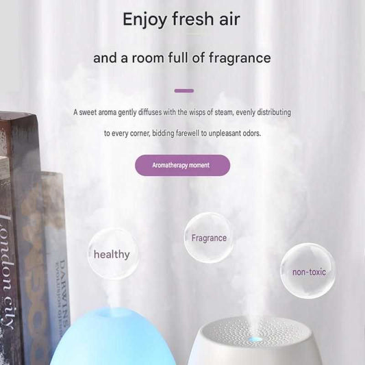 Office Comfort Gift Bundle featuring a blue and white aroma diffuser releasing a gentle mist for indoor fragrance.