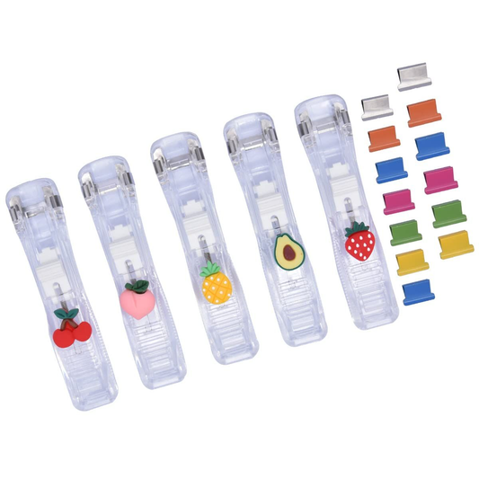 Office Supplies Push Stapler set with five clear plastic handheld tools decorated with colourful fruit motifs and metal clips