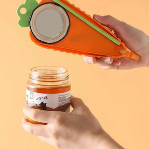 Orange Carrot-Shaped Multi-Function Bottle Opener in orange plastic with green accents and a round adjustable grip