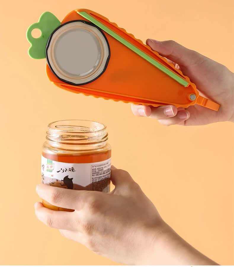 Orange Carrot-Shaped Multi-Function Bottle Opener in orange plastic with green accents and a round adjustable grip