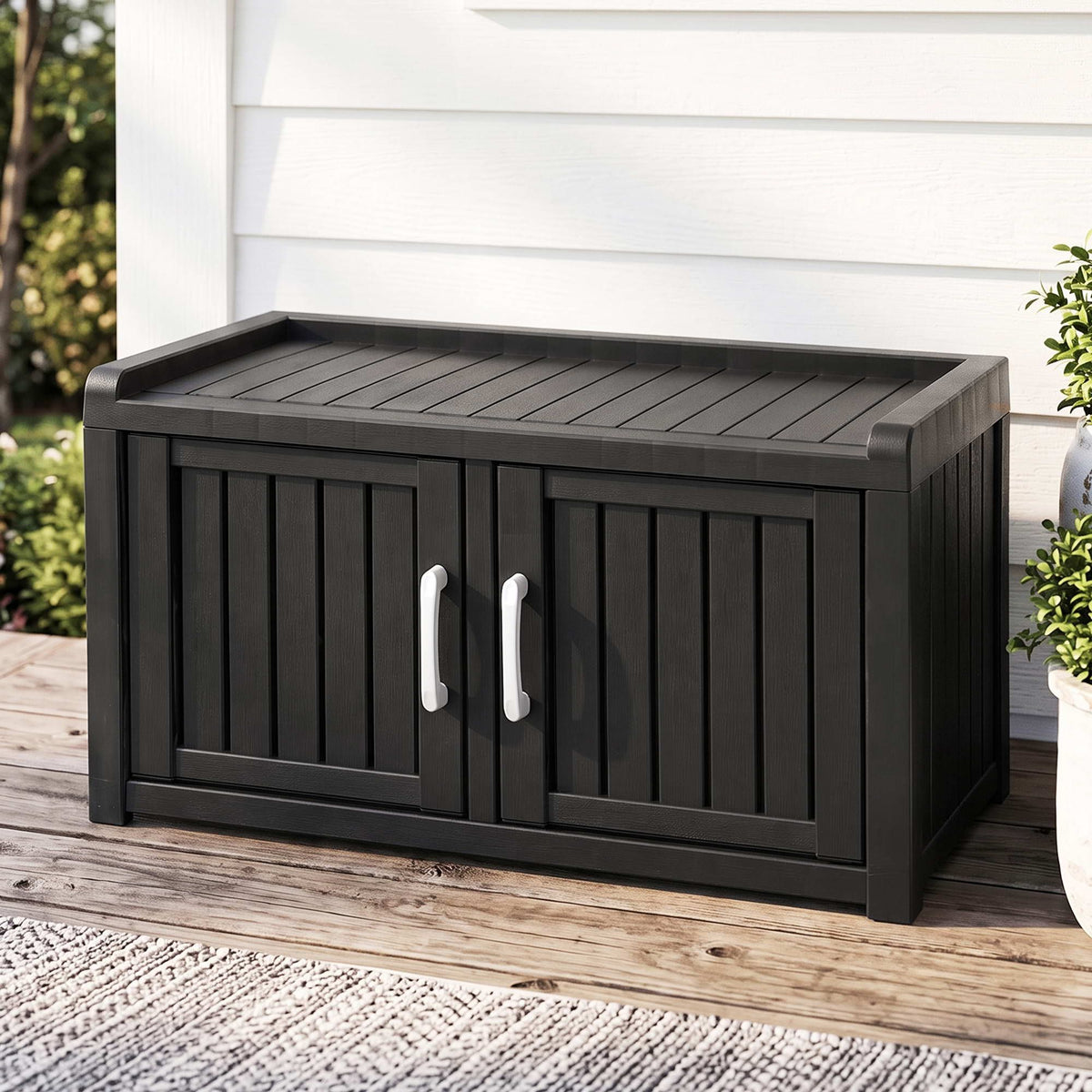 Outdoor Storage Box Bench in black resin with a slatted wood-look seat, double doors and silver handles