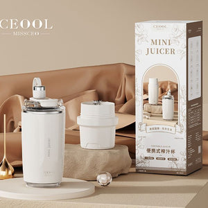 Personal Juicer with a white cylindrical body, clear blending lid, and separate white drinking cup with a compact design