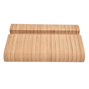 Portable Phone Stand in natural light bamboo with visible grain, rounded edges and a long recessed device groove