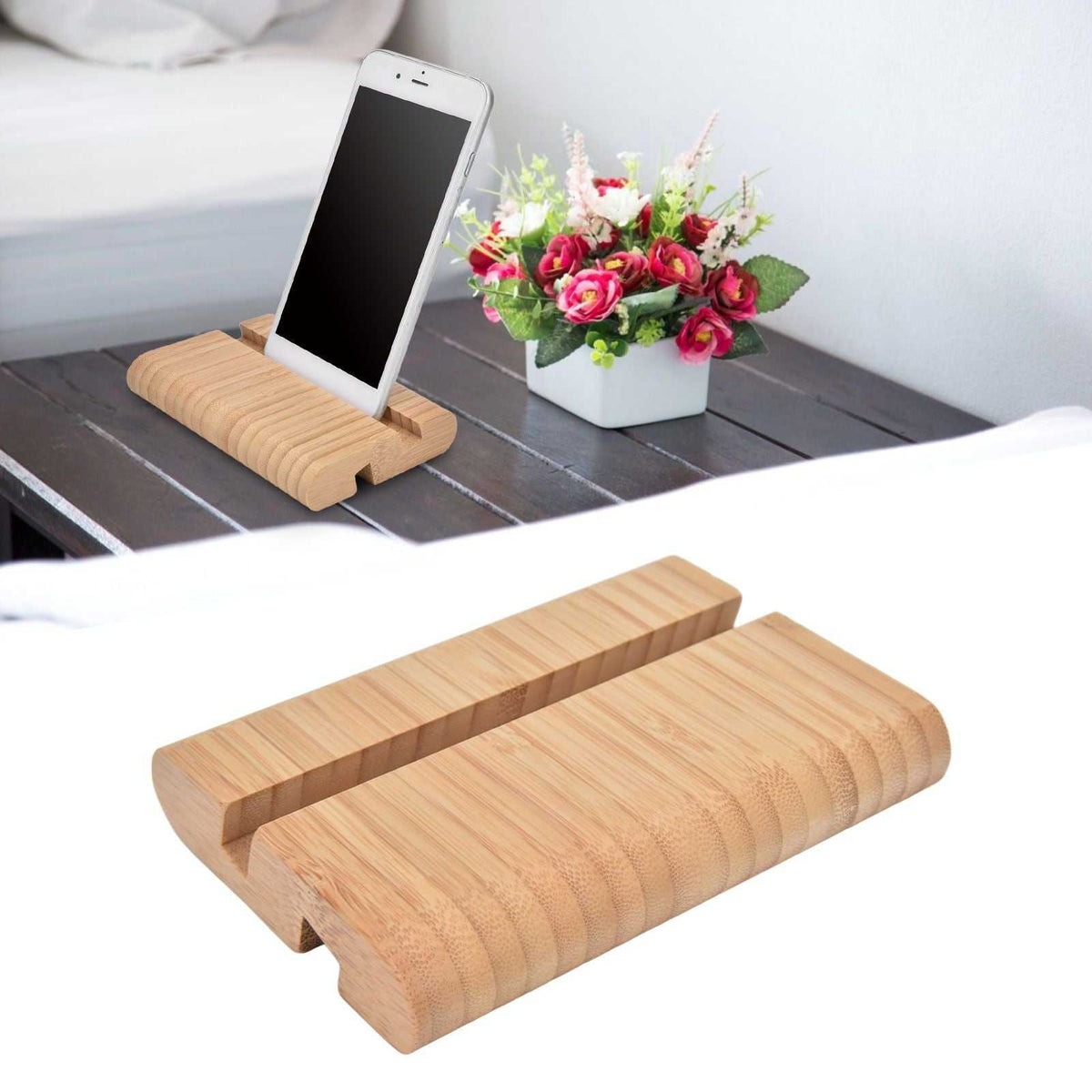 Portable Phone Stand made from natural light bamboo, with a rounded grooved base and raised device slot.