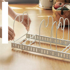 Pot Lid Rack Iron with silver wire frame, adjustable base and upright U-shaped slots for holding lids