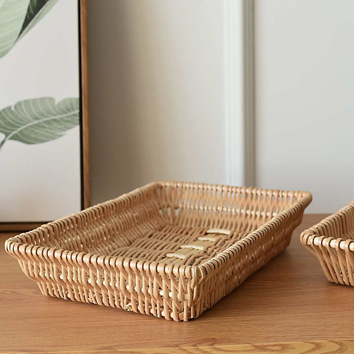 Rattan Storage Basket in natural woven rattan, rectangular with a low rim and sturdy open-weave sides