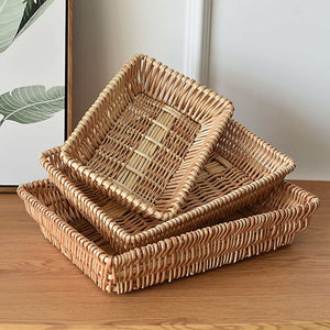 Rattan Storage Basket set with three stackable woven trays in natural tan rattan, featuring rounded corners and open tops