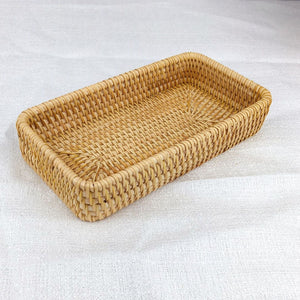 Rattan Tray Tabletop Organization: natural tan hand-woven rattan tray with a rectangular shape and raised sides