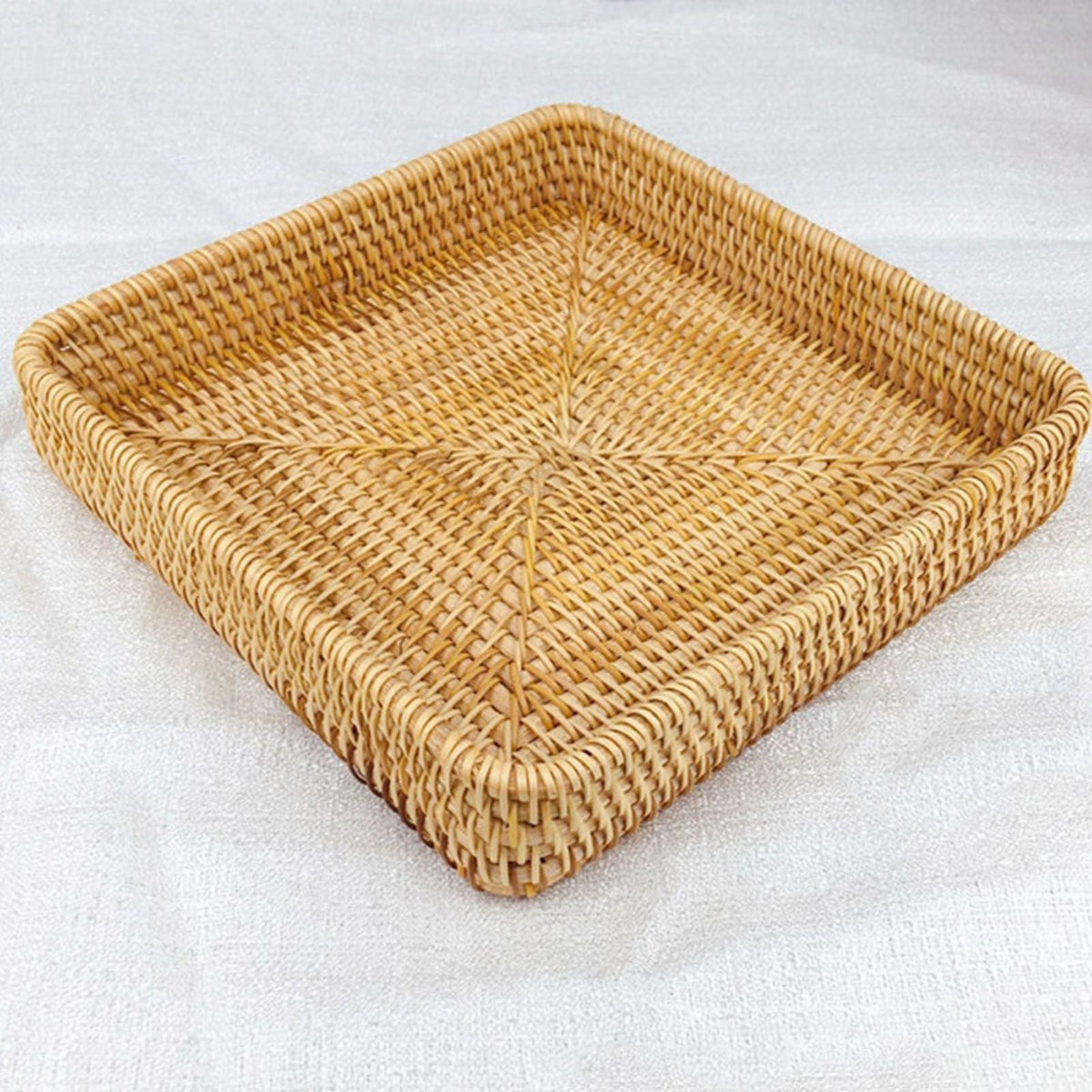 Rattan Tray Tabletop Organization, square natural tan woven rattan tray with raised sides and a tightly braided rim