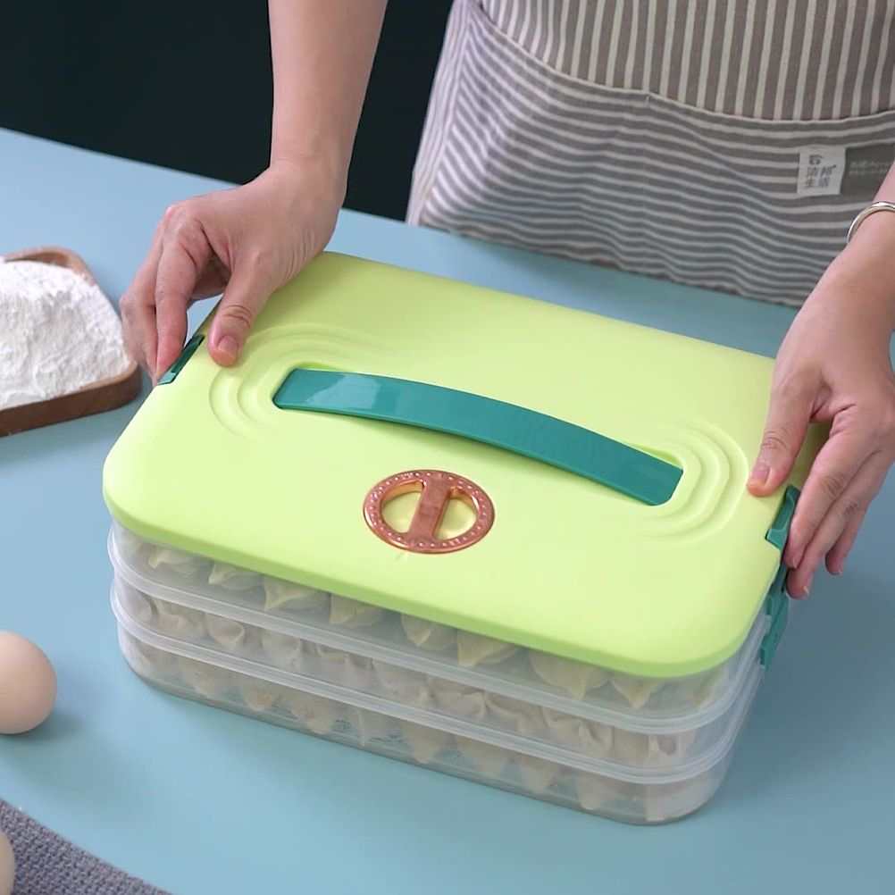 Refrigerator Food Shelf storage box with three clear plastic tiers, lime green lid, teal handle and circular date dial