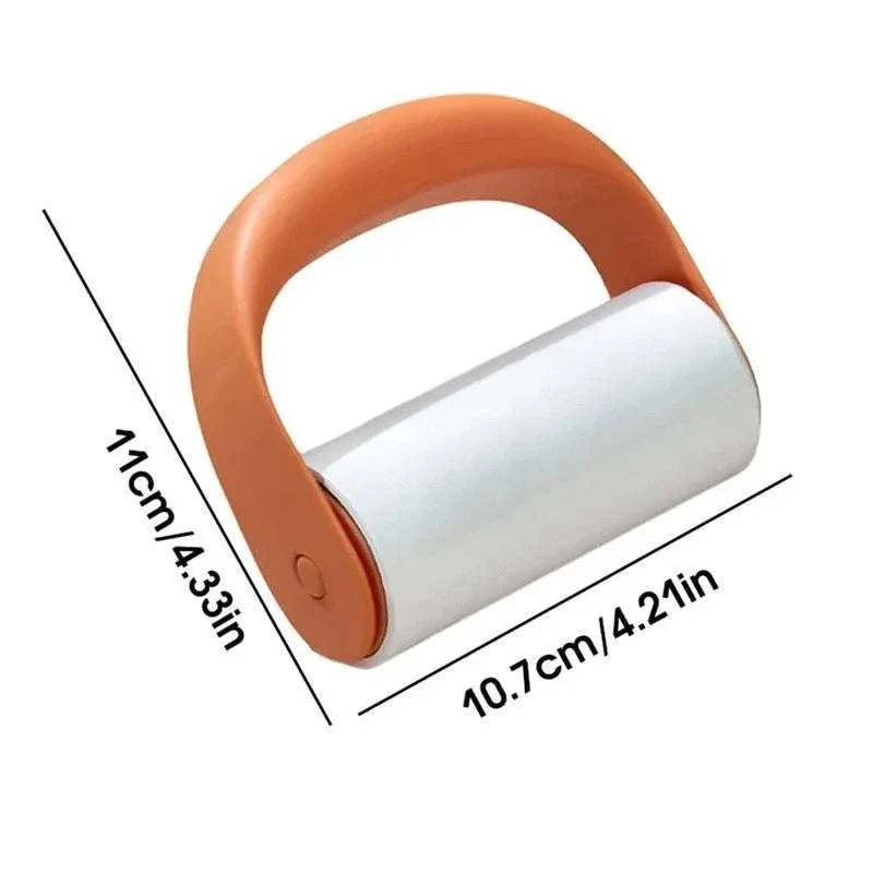 Reusable Lint Roller with orange plastic handle and white adhesive paper roll measuring 10.7cm by 11cm