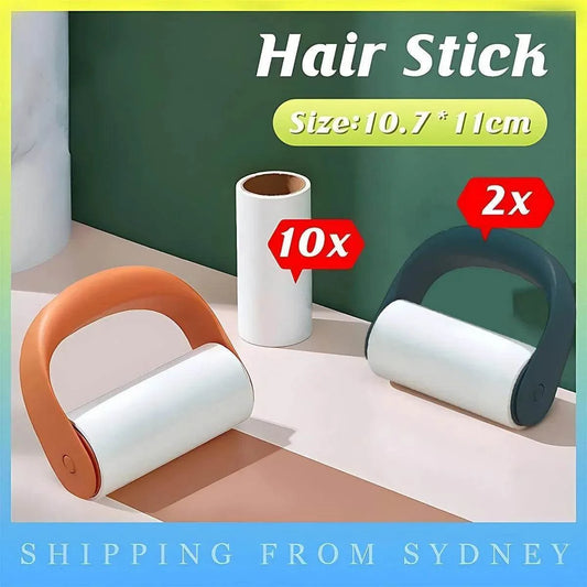 Reusable Lint Roller set with two orange and black plastic handle rollers and ten white refill rolls for pet hair removal
