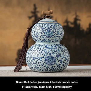 Ru Kiln tea jar with a rounded double-gourd ceramic body, blue floral scrollwork, wooden lid and dark tassel