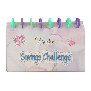 Savings Binder 52 Week challenge book with a frosted pastel marble cover, colorful binding rings, and Savings Challenge lettering