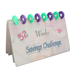 Savings Binder 52 Week with a pastel marble-patterned cover, blue savings challenge lettering and green and purple rings