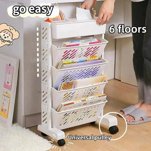 Six Tier Rolling Storage Cart with white plastic frame, six angled magazine shelves, top tray and swivel wheels