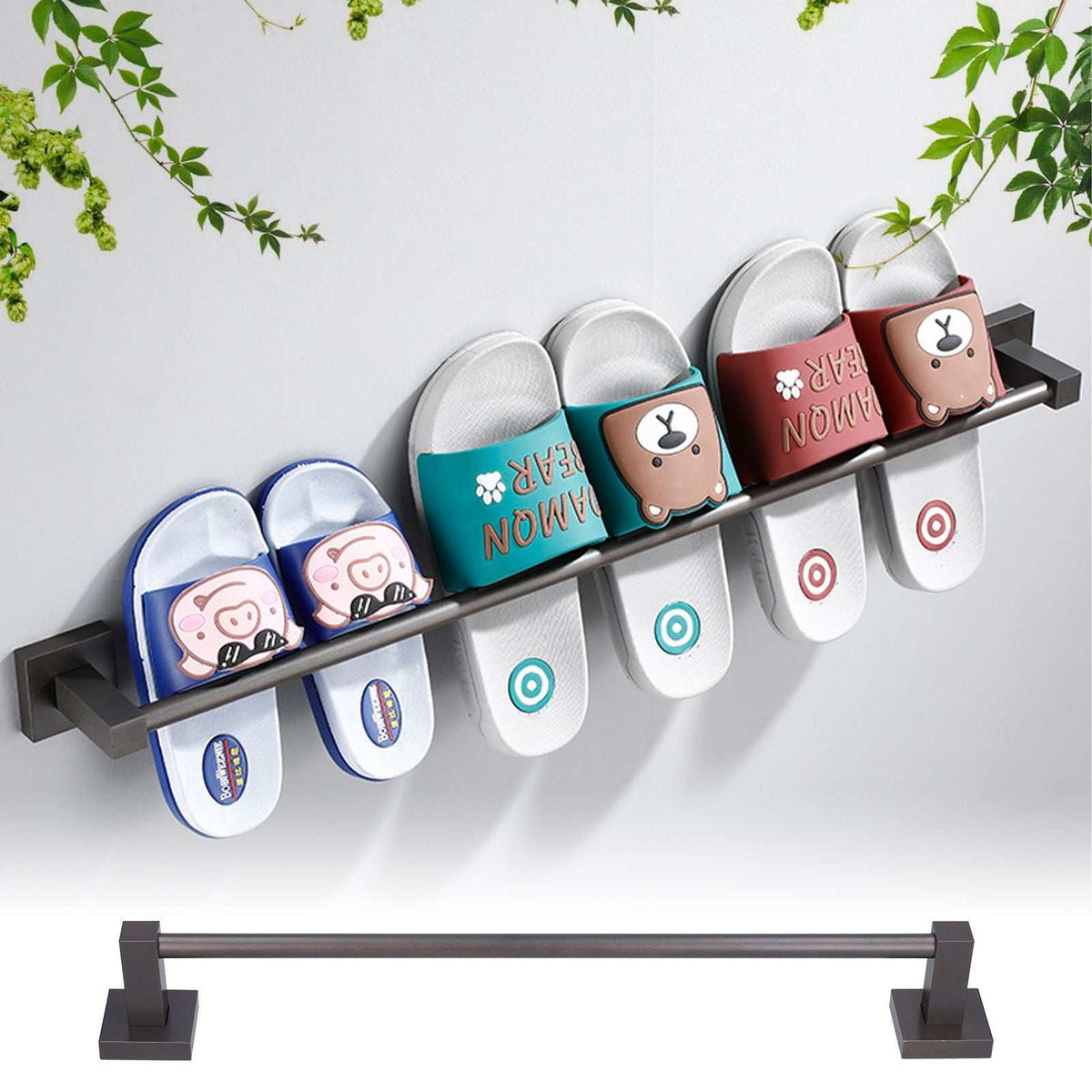 Slippers Rack Grey shows a dark grey metal wall-mounted rail holding five pairs of colourful cartoon-print slides.